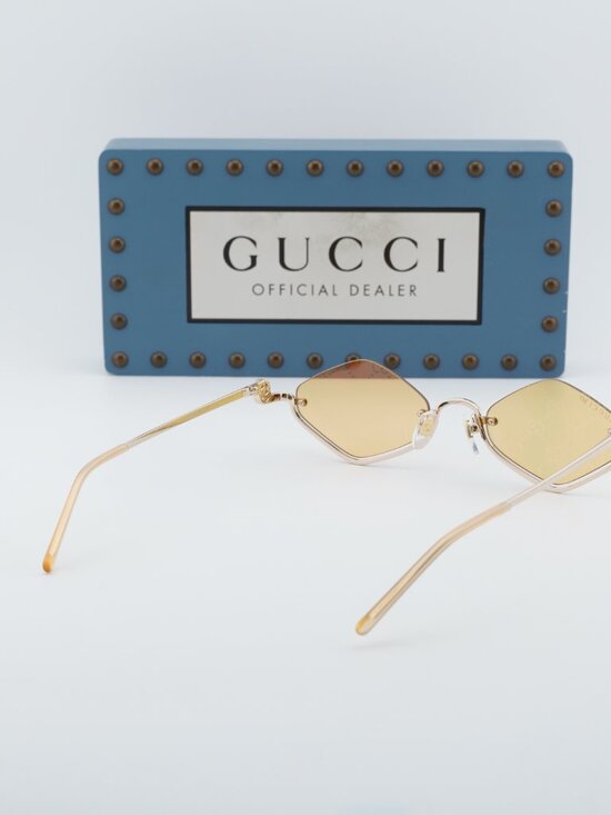 Gucci GG1604S 004 Geometric Sunglasses - Gold main image 7
